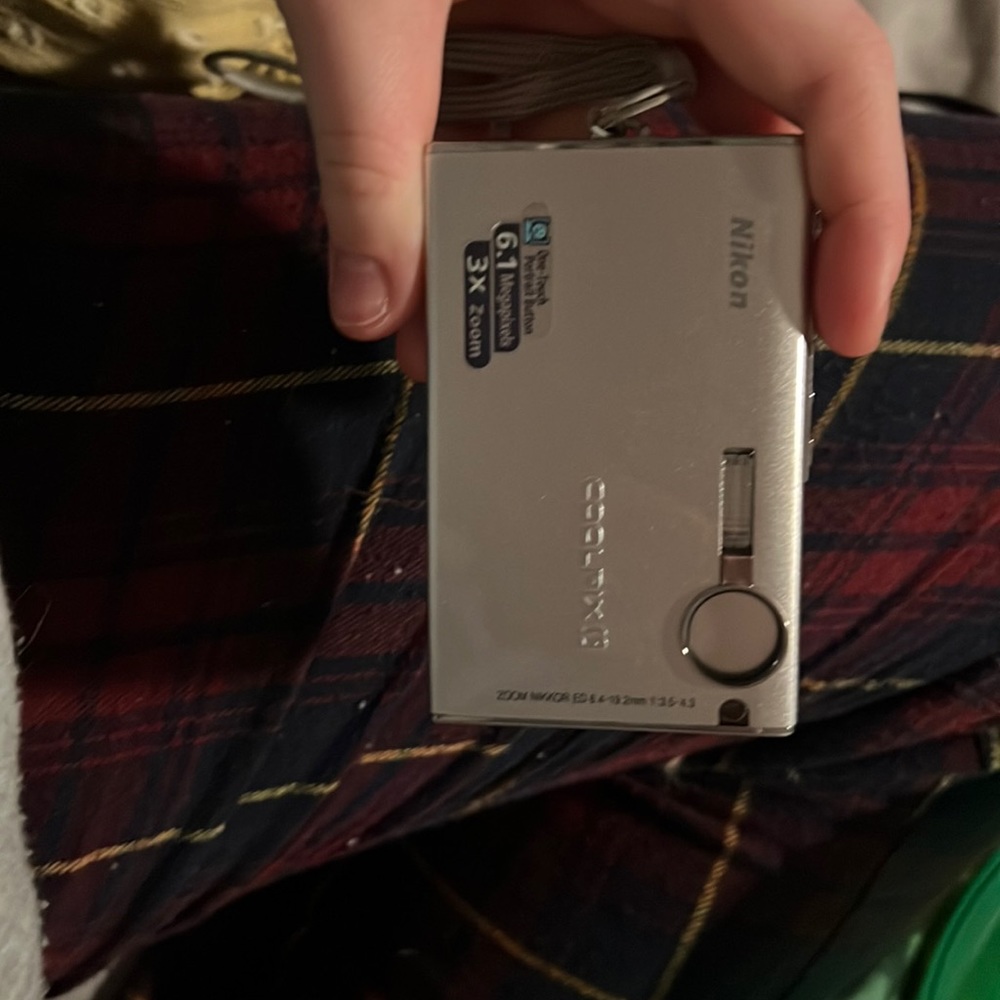 Nikon camera with charger and case